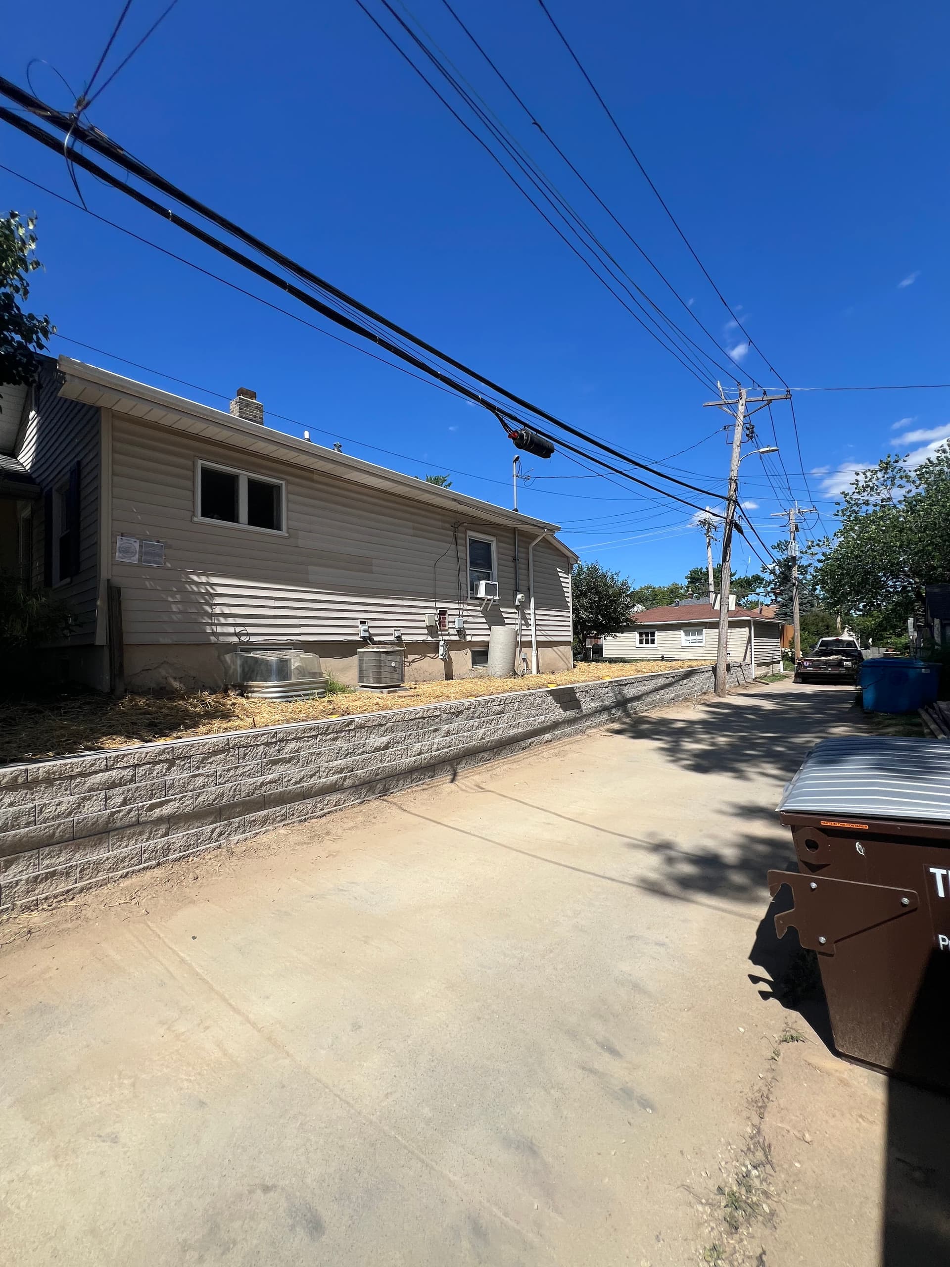 Versa-Lok Retaining Wall Keeps This Yard Locked In